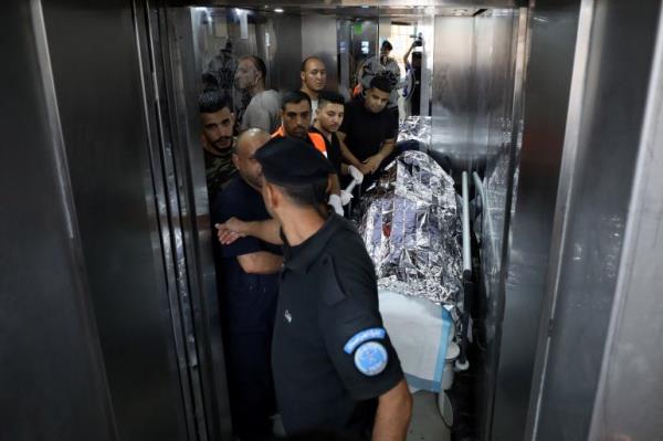 Medics transport the body of Aysenur, a US citizen, after she succumbed to her wound from a reported gunshot, at a hospital in Nablus in the occupied West Bank on September 6, 2024 