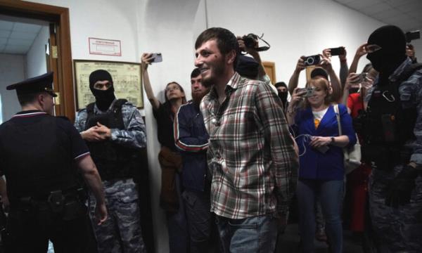 Russia detains two dozen over deadly Moscow shootout